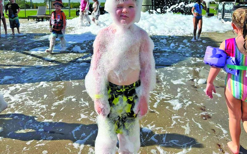 Courtesy photo Bay City YMCA observed the rapid approach of school with the last field trip of the summer - a foam swim party.