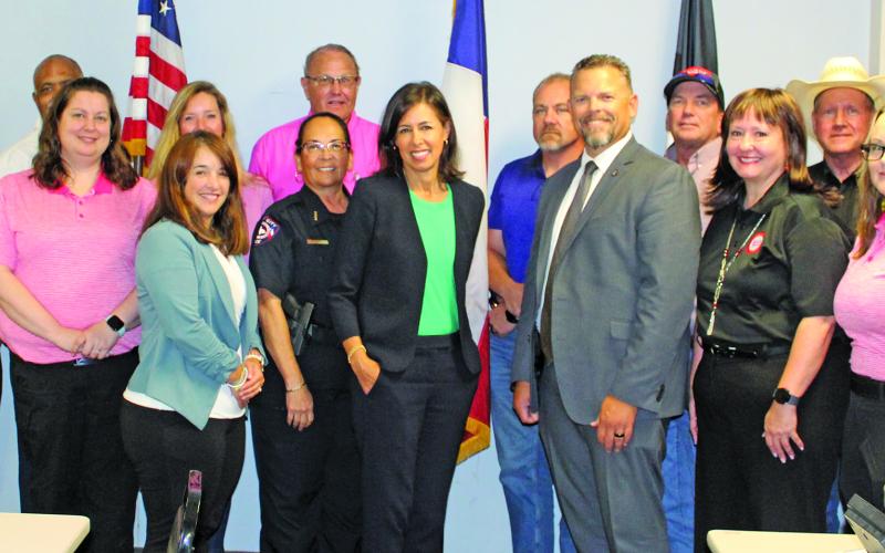 Sentinel Photo/Mike Reddell Federal Communications Commission (FCC) Chairwoman Jessica Rosenworcel (center) visited Emergency Operations Center last week to hear communication problems Matagorda County had following Hurricane Beryl’s landfall July 8.