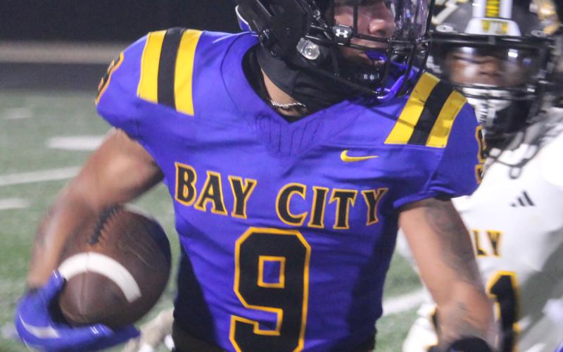 Sentinel Photo/Mike Reddell Bay City senior linebacker Isaiah Gonzales (9) looks downfield on a punt return against Sealy. Gonzales was Bay City’s leading tacker Friday night, with 15 unassisted stops.