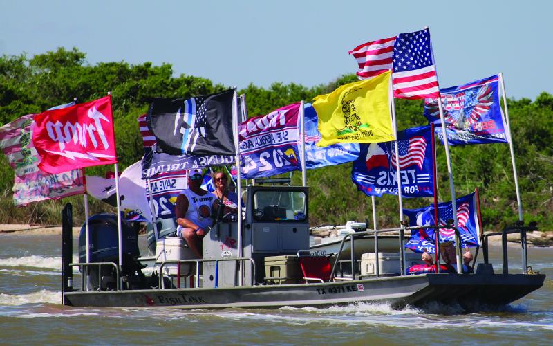 Sentinel Photo/MaLinda Reddell Supporters of former President Donald Trump proudly displayed their different Trump campaign flags for a boat parade Saturday, Sept. 7, on the Colorado River channel, starting near the mouth, and making its way up river. About 65 boats participated in the procession.