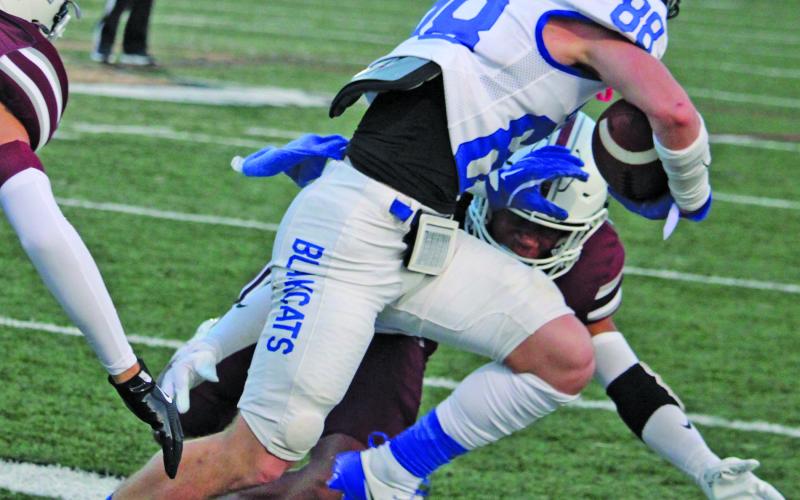 Sentinel Photo/Mike Reddell Bay City senior wide receiver Keaton Nunez (88) picks up yardage en route to 87 receiving yards and a touchdown.