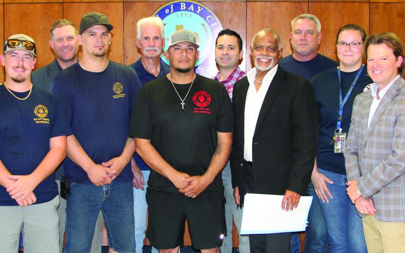 Sentinel Photo/Mike Reddell Bay City Volunteer Firefighters joined City Council members Oct. 8, when Mayor Robert Nelson  proclaimed the week of Oct.6-12, as Fire Prevention Week, and October as Fire Prevention Month in tBay City, with the theme, “Smoke Alarms: Make Them Work for You.”