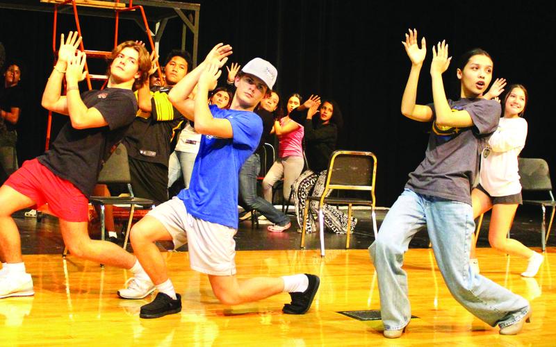 Sentinel Photo/Jessica Shepard Bay City High School Dungeoneers are hard at work during "Chicago: Teen Edition" rehearsal getting their choreography nailed down Monday, Oct. 7. The musical showcase debuts Thursday, Nov. 7 at 7 p.m. with tickets for sale online in advance and at the door.