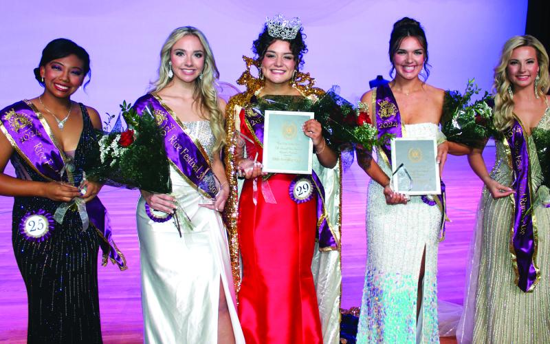 Sentinel photo/Jessica Shepard The Bay City Lions Club 2024 Rice Festival Queen is Victoria Sliva (center). Her court features 4th runner-up Tatiana Sanchez, 3rd runner-up Paislei Lee, 1st runner-up Kaylee Spencer, and 2nd runner-up Meredith Williams. The queen was crowned Saturday, Oct. 12.