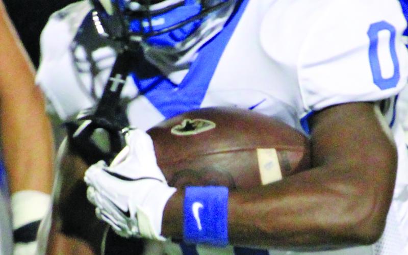 Sentinel Photo/Mike Reddell Bay City’s Jada Andrews (0) picks up yardage against La Vernia Friday. He slashed the Bears’ defense for 124 yards.