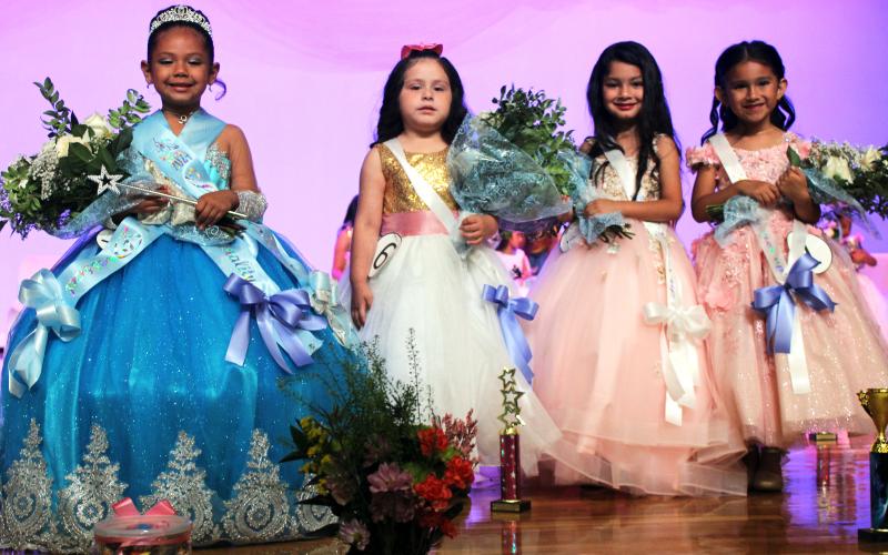 Sentinel Photo/Jessica Shepard The 2024 Little Miss Rice Festival court features overall winner Xandria Rodriguez with 1st runner-up Abigail Montes, 2nd runner-up Loren Garcia, and 3rd runner-up Gianna Rosas.