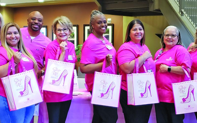 Sentinel photo/Jessica Shepard Matagorda Regional Medical Center, Matagorda Medical Group, and Natera staff donned pink in support of Breast Cancer Awareness Month at the breast exam and Natera genetic screening session Saturday, Oct. 5. Patients participating received a goody bag full of breast cancer and women's health information along with a variety of promotional items.