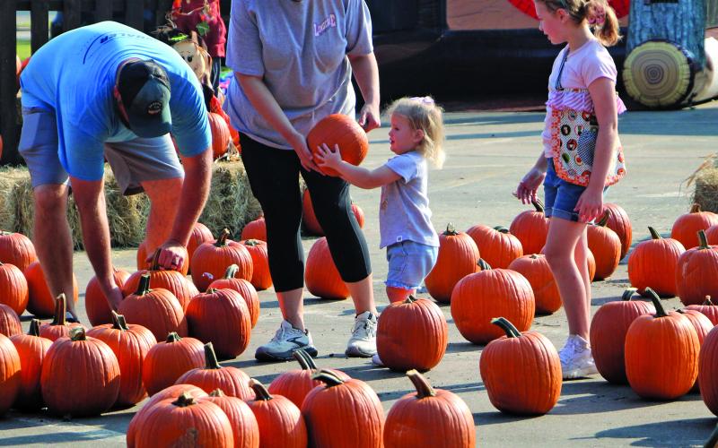 Sentinel Photo/Mike Reddell First United Methodist Church had its annual “Sunshine and Rainbows Pumpkin Patch Fundraiser” Saturday, Oct. 12, with several events, that included bounce houses, hay rides, a bake sale, fall games and face painting. All funds raised will help support Sunshine and Rainbows Preschool.