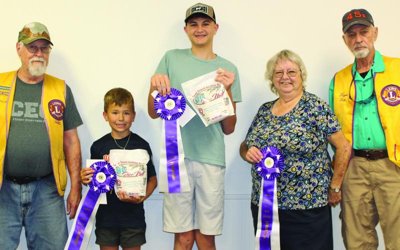 Sentinel Photo/Jessica Shepard 2024 "Rice Dish Roundup" grand champion winners were chosen from each respective age division on Tuesday, Oct. 15 From left are Carter Busby, Joseph Machacek, and Kathy Jackson. Not pictured is Austin Machacek. Winners were joined by Bay City Lions Club member Tim Hall and Rice Dish chairman Wayne Witte.