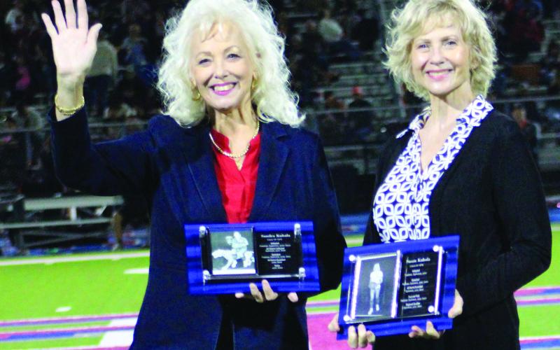 Sentinel Photo/Jessica Shepard Tidehaven High School inducted three new Hall of Fame members during halftime on Friday, Oct. 18. From left are Sandra Kubala and Susan Kubala, Class of 1975 and 1976, respectively. Not pictured is Class of 1978’s Matt Williams.