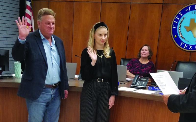 Sentinel Photo/Mike Reddell Mayor Robert Nelson, right, swears in three new appointees at City Council’s Nov. 12 meeting. The three were, from left: Angela Hadash, Deputy City Secretary; Bruce Krauskopf, Planning Commission board; and Melody Ann Yates, Bay City Housing Authority board.