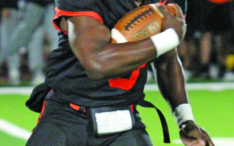 Photo by Anna Hernandez Van Vleck’s Corey Austin (0) runs picks up a needed 1st down during the game Friday night.