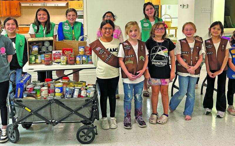 Contributed photo Bay Pals Girl Scout Troop #156991 collected can goods and non-perishables to help local BCISD students in need for the 1st annual can food drive. “With the upcoming holidays, we know there are many kids in Matagorda County that need a little more help,” said Troop Leader Nina Hernandez.