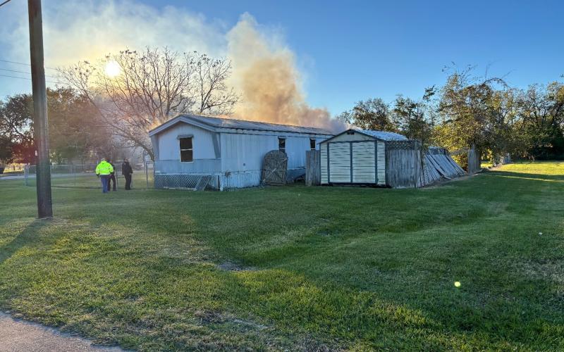 Sentinel photo/MaLinda Reddell Vacant trailer engulfed with flames Wednesday, Dec. 11