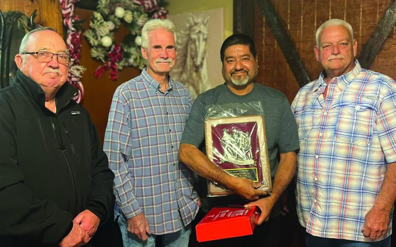 BCVFD Photo The Bay City Volunteer Fire Department held their annual awards ceremony and Christmas Party, Dec. 10. From left, Assistant Chief Bob Klepec, Chief Randy Fronz, Camilo Reyes- Firefighter of the Year for 2024, and Assistant Chief Mike Coppock.