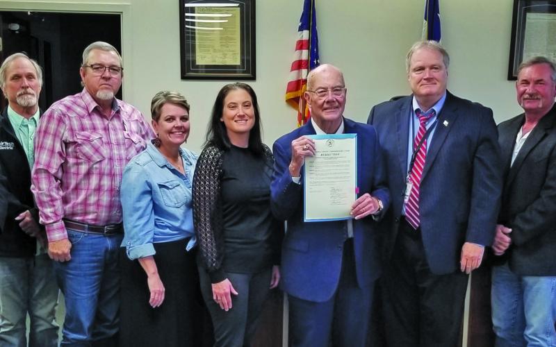 Sentinel Photo/Mike Reddell Commissioners Court honored Judge Ben Hardin, center, with a resolution noting his fairness, long years of service and being a good listener.