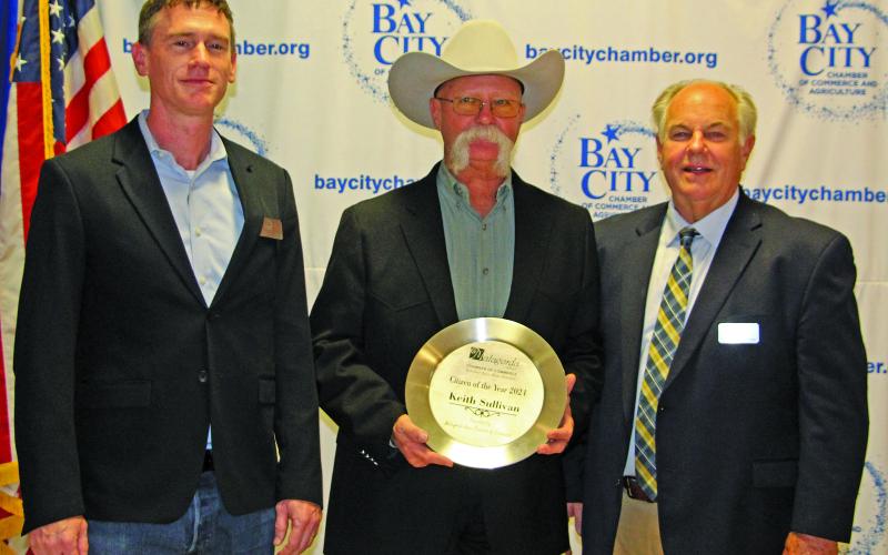 Sentinel Photo/Jessica Shepard Matagorda Area Chamber of Commerce Person of the Year Keith Sullivan, center, with Gullett and Dickerson.