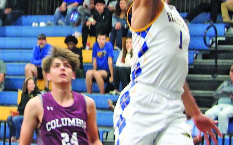 Sentinel Photo/Mike Reddell Blackcat senior guard Alex Estrada (1) makes a layup against Columbia here Friday, Feb. 7. The Blackcats defeated the Roughnecks 59-44 and have a 11-10, 6-7 record - fourth in district play. Bay City played Brazosport Monday, Feb. 10.