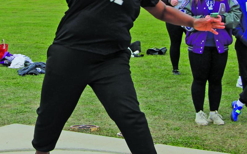 Sentinel Photo/Mike Reddell Bay City’s Malorie Richardson-Clay heaves the shot put in competition last week.