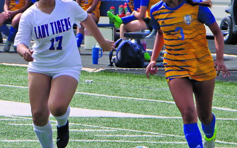 Sentinel Photo/Mike Reddell Lady Cat Peyton Benavides (3) moves the ball Saturday. The girls, 11-2-3, 6-0, and first in district, played Palacios Monday.
