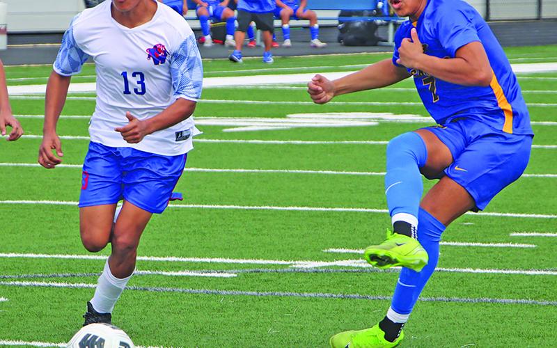 Sentinel Photo/Mike Reddell Blackcat Tristan Ortiz (7) makes a shot at goal aginast Wharton here Saturday, Feb. 8. Bay City won 8-0 and is first in district.