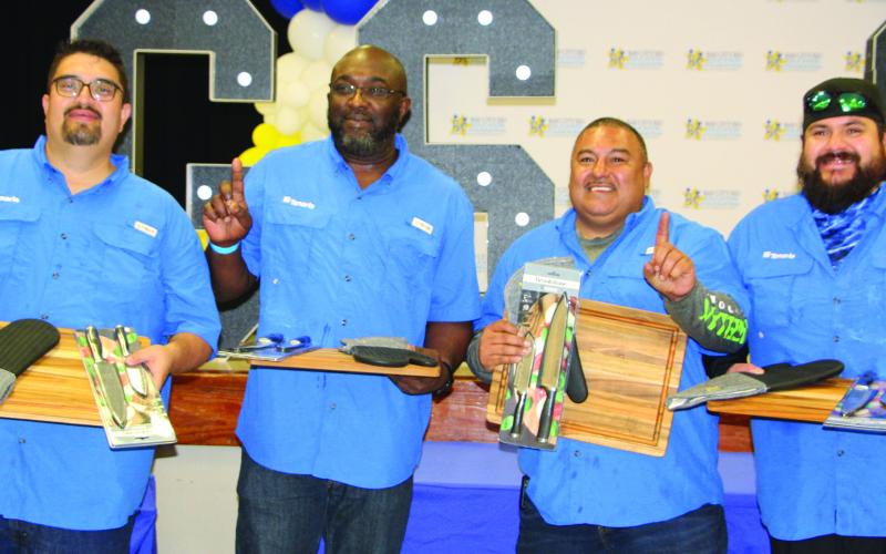 Bay City ISD Education Foundation's Annual Great Steak Cook-Off's “Best Steak” award was given to Tenaris Bay City's "Pipin' Hot Cookers" team on Saturday, March 22. Above are team members Josue Noriega, Mike Montalvo, Lorenzo Henderson, and Jesus Vera. In keeping with cookoff tradition, Tenaris' team was auctioned off to prepare a steak dinner for 10 to the highest bidder for $5,500. See Page 5 for more Great Steak Cookoff winners’ photos.  Sentinel Photo/Jessica Shepard