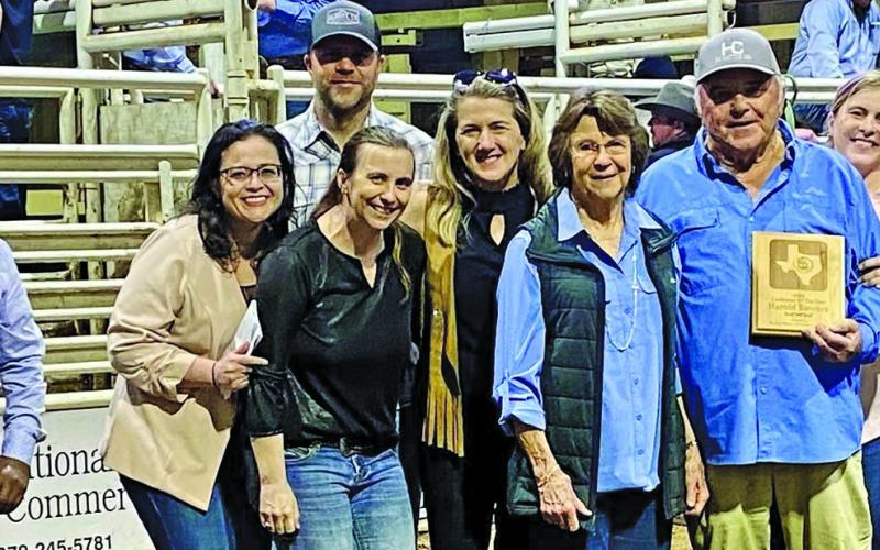 Contributed photo The 2025 “Cattlemen of the Year” title was awarded to Harold Bowers, center, with his wife Cheryl Bowers, who together have farmed grain, farmed seafood, and have raised up to 800 head of cattle on 3,000 acres of land.