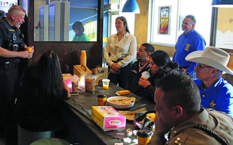 Sentinel Photo/Jessica Shepard Local law enforcement personnel with the Matagorda County Sheriff's Office and Bay City Police Department were on hand for "Coffee with a Cop" at McDonald's on Friday, Feb. 28. The event featured free coffee, cookies, donuts, and other sweets along with attendees getting the chance to work behind the counter at the restaurant.