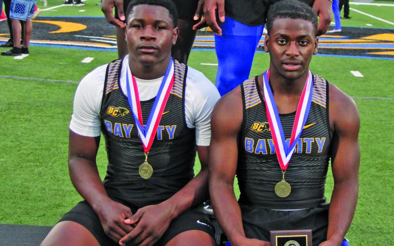 Sentinel Photo/Mike Reddell Bay City 4x200 relay team of Jada Andrews, Javius Andrews, Xylan Williams, Keimarion Wiggins took first place in last week’s district track meet and will advance to this week’s area meet.