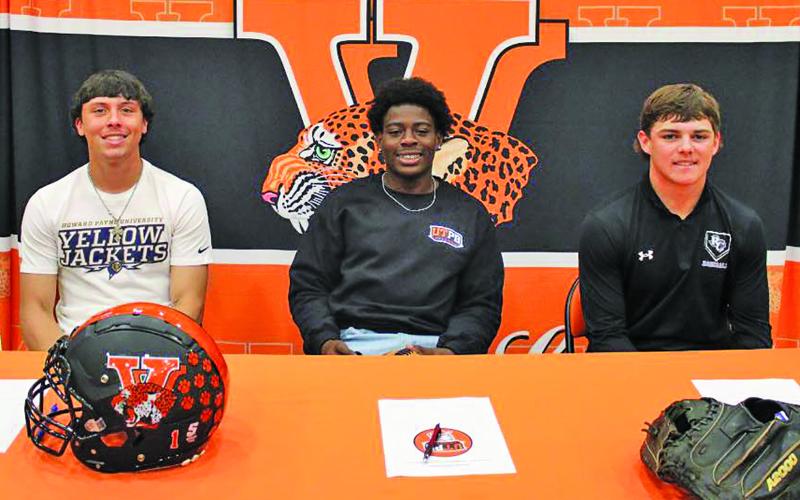Van Vleck ISD photo Van Vleck High School recently had three Leopard student-athletes sign their college papers to play at the next level. The three were, from left: Logan Carter (Howard Payne Football); Corey Austin (UTPB Football), and Wade Hutson (Ranger College Baseball).