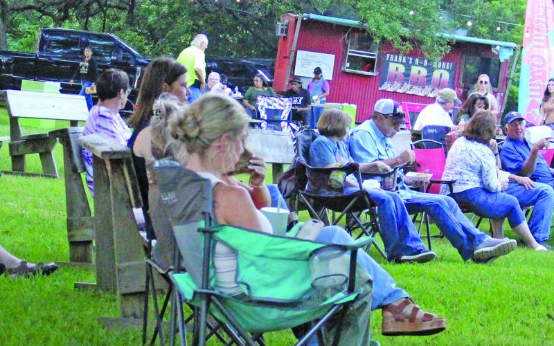 There was quite a crowd enjoying the food, fun, and tunes at the Matagorda Birding Nature Center's "Arbor Day Food Truck Festival" Friday, April 25. Attendees also had their choice of beer, wine and other beverages, too.  Sentinel Photo/ Jessica Shepard