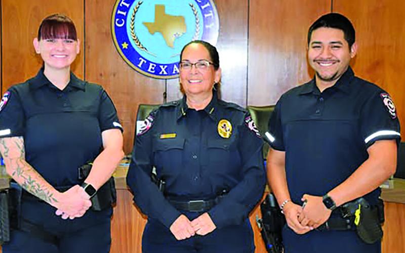 Contributed photo Police Chief Christella Rodriguez, center, recently swore in two new Bay City Police Department officers. They are, Demi Bujnoch, left, and Efrain Robles.