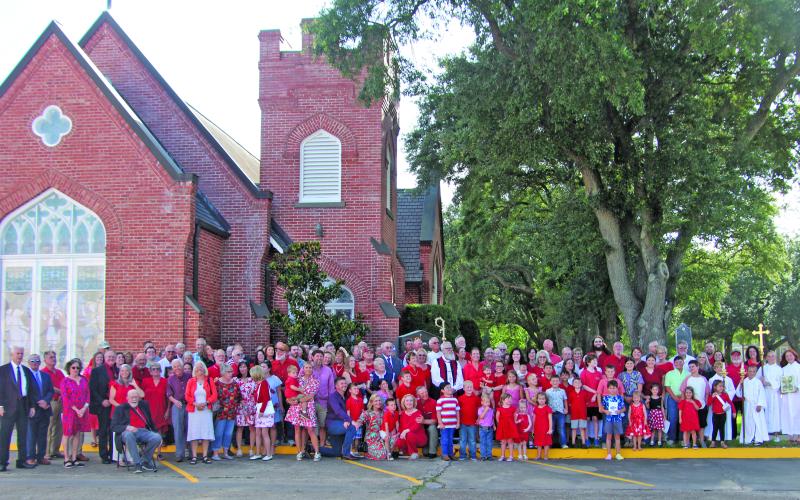Sentinel Photo All the St. Mark’s Episcopal Church members present for the Sunday service gathered afterwards in front of the church at the corner of Avenue E and 6th Street for a church family photograph by a drone that was scheduled to photograph the members on this special day.