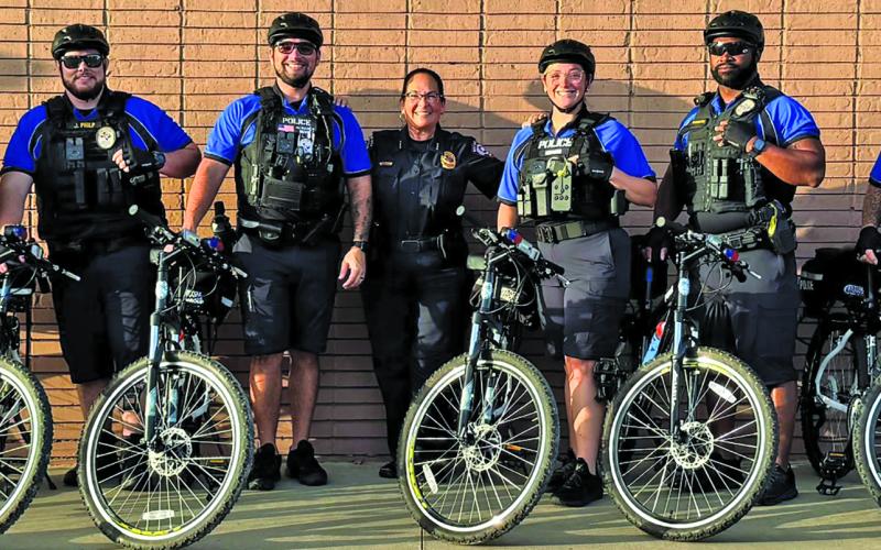 BCPD photo Chief Christella Rodriguez stands proudly with our newly certified Bike Patrol Officers—joined by a couple of currently certified officers—who are all ready to roll.