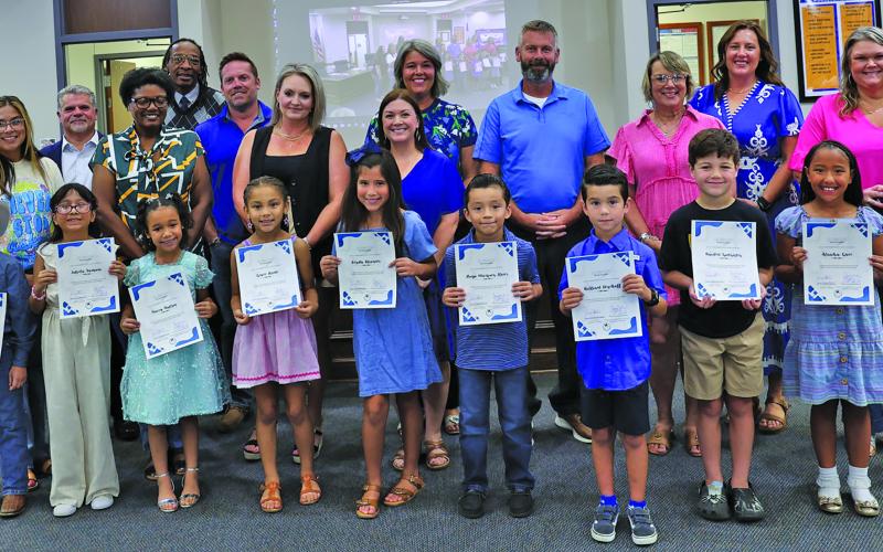 BCISD photo Linnie Roberts students, who earned top performance honors in both math and reading, were recognized by the Bay City ISD at a recent school board meeting.