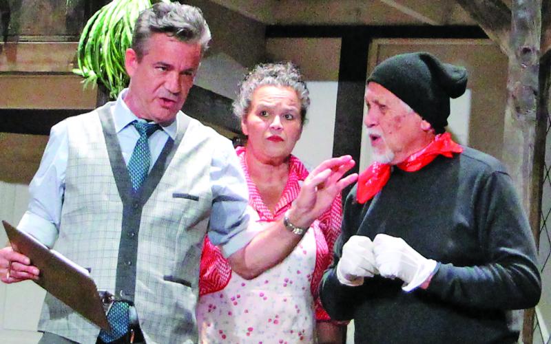 Sentinel Photo/Jessica Shepard Above, Daran Norris, Steven Reis, and Magda Mirelez work out scripted dialogue woes during press night on July 31