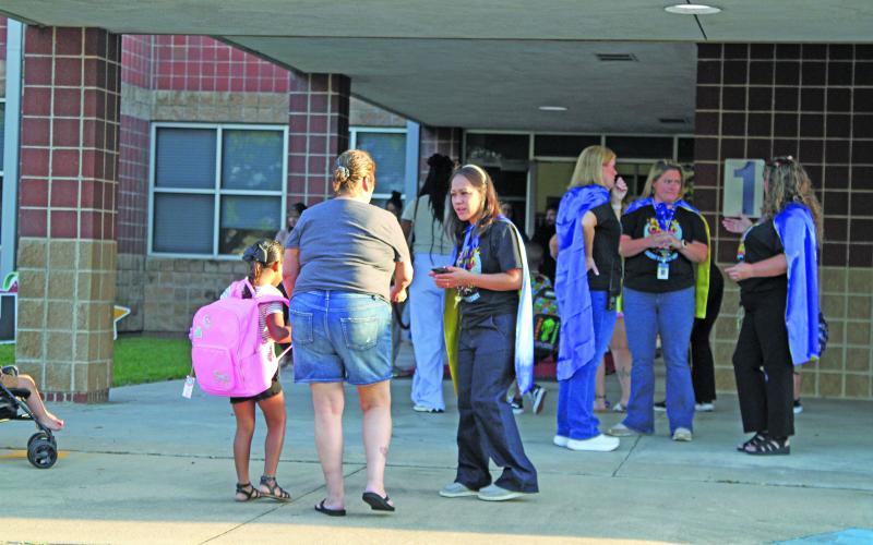 Photo by Anna Hernandez Cherry Elementary staff dressed as super heroes to help students and parents on the first day of school last week.