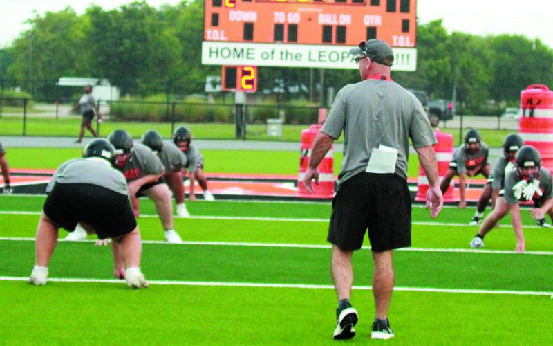 Photo by Anna Hernandez Van Vleck Coaches oversee Leopard drills during first week of workouts. Leps will scrimmage Weimar at home Friday.