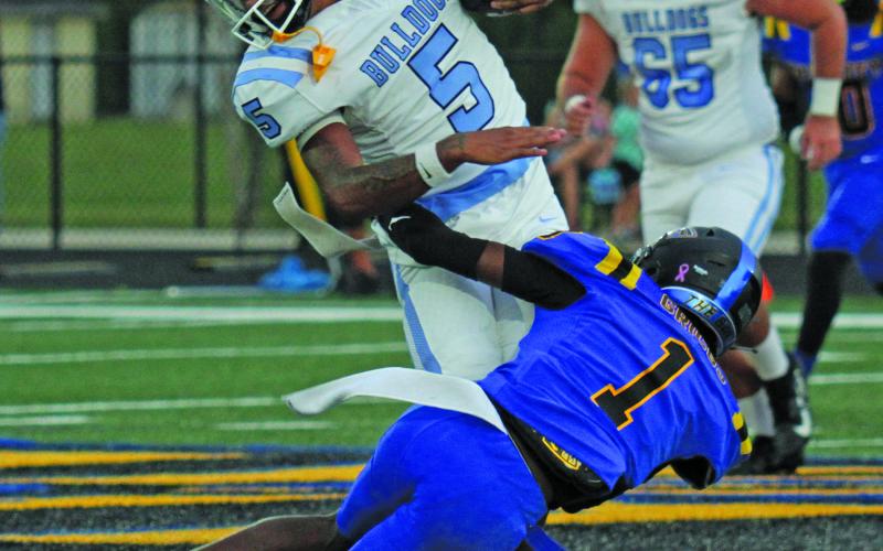 Anna Hernandez photo Blackcat defender Jasiri Griggs (1) brings down a Sweeny running back.
