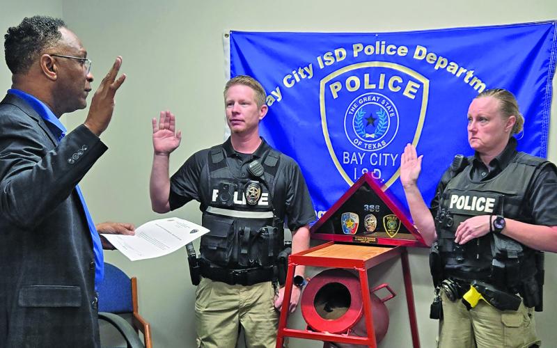 BCISD photo The Bay City ISD Police Department held a small ceremony to swear in two new police officers on Tuesday, Sept. 2. The ceremony was at the Bay City ISD Police Department with Chief L.C. Cunningham, Jr. swearing in Officer Anthony Rabun and Officer Heather Lewis to the Department.