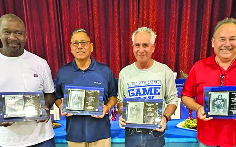 Contributed photo The Tidehaven Athletic Booster Club recognized and celebrated the 2025 Tidehaven Athletic Hall of Fame: George Woods, Gary Lara, Alex Galvan, and Ricky Galvan. The club membership said it was a privilege to meet these remarkable men, spend time with them, and pay tribute to their contributions to Tidehaven Athletics. They were honored at halftime of the Tidehaven/Palacios football game on Friday, Aug. 29.