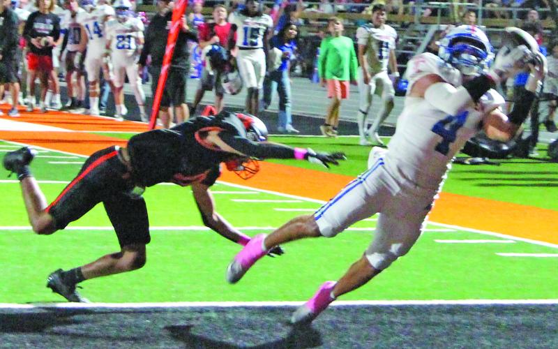 Sentinel Photo/Jessica Shepard Tidehaven senior wide receiver Boogie Galvan (4) pulls in a pass from Tiger quarterback Kale Russell for a touchdown.
