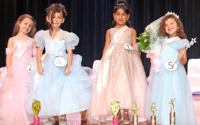 Sentinel photo/Jessica Shepard The 2025 Little Miss Rice Festival court features 3rd runner-up Adalynn Phillips, 2nd runner-up Freya Hardin, 1st runner-up Sophie Baeza, and overall winner Natalia Peachey.