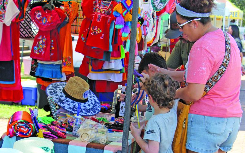 Sentinel Photo/Jessica Shepard Market Day vendors were out in force, providing an assortment of wares for customers on Saturday, Sept. 27. The beautiful weather highlighted everything from food and drink to toys, knives, and non-profit booths.