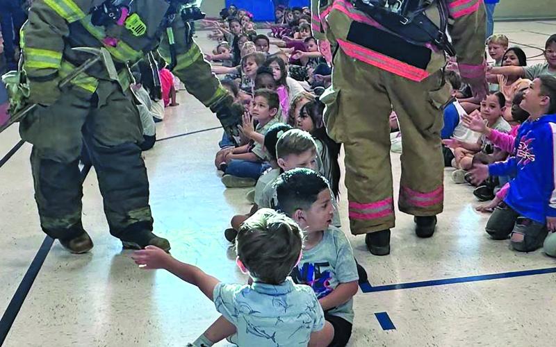 Courtesy photo Markham Volunteer Fire Department came to Markham Elementary School to teach students about fire safety during Fire Prevention Week.