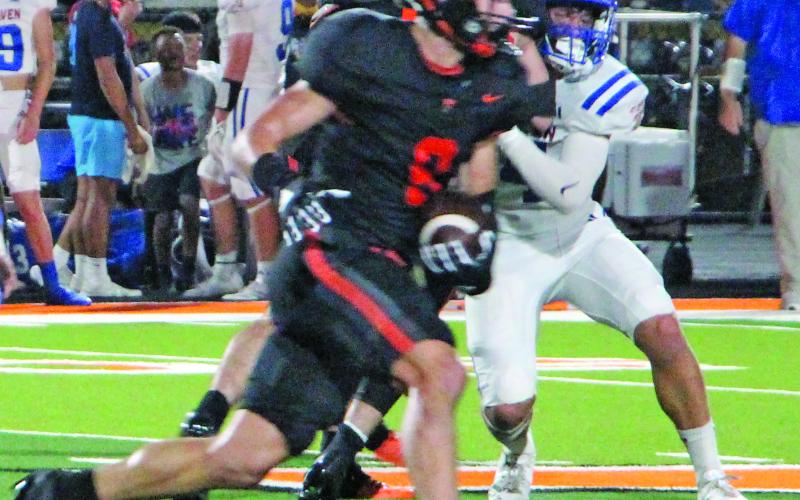 Sentinel Photo/Jessica Shepard Van Vleck running back Connor Garrison (6) moves against Tidehaven Friday night.