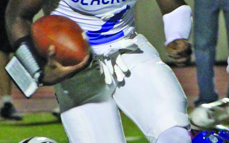 Sentinel Photo/Mike Reddell Junior Keimarion Wiggins (2) was the second leading rusher against Floresville (9) with 66 yards on 10 carries. Scoring both of Bay City’s rushing touchdowns, Wiggins led off Bay City scoring with an early 12-yard touchdown.