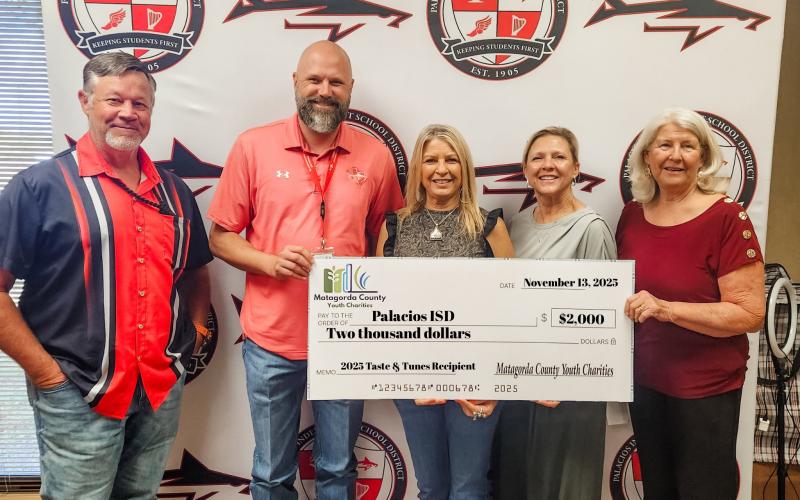 Contributed photo Matagorda County Youth Charities presented a $2,000 donation check to Palacios ISD on Nov. 13.