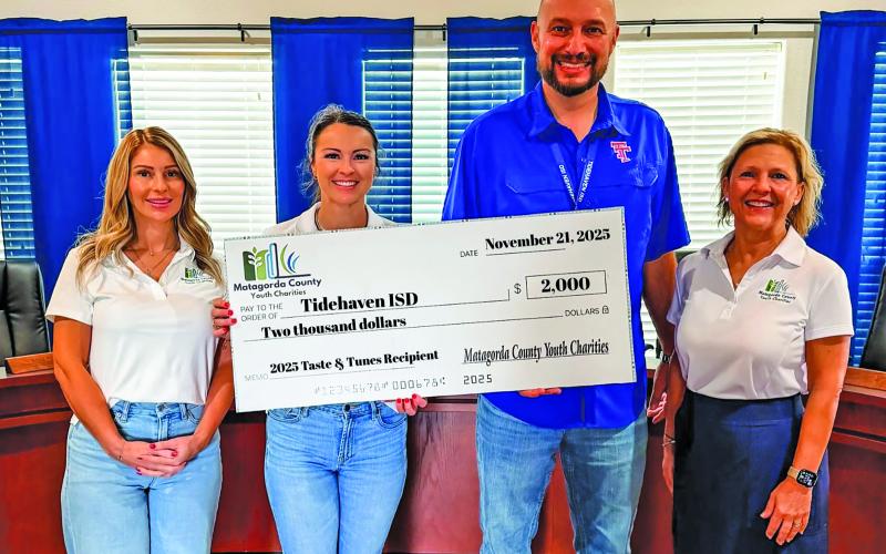 Contributed photo ) Matagorda County Youth Charities presented a $2,000 donation check to Tidehaven ISD on Nov. 21.