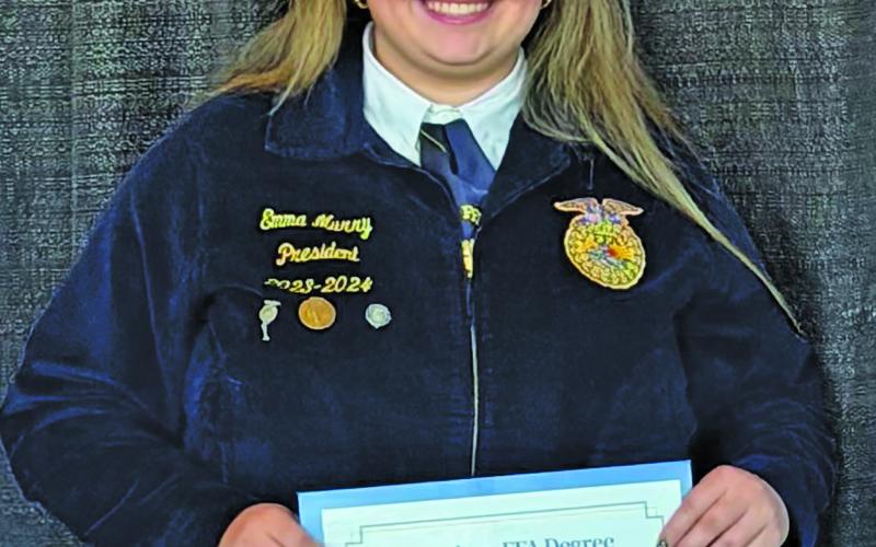 Photo courtesy of FFA Tidehaven FFA member Emma Murray shows off her American FFA Degree